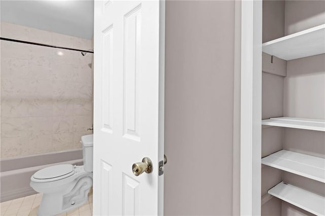 703 Townsend Cir, Chickasaw, AL 36611 - full bath featuring toilet, shower / bath combination, and tile patterned flooring