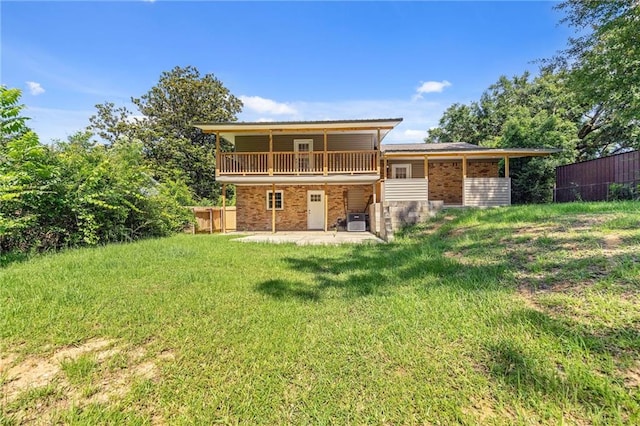 703 Townsend Cir, Chickasaw, AL 36611 - rear view of property featuring a patio, central AC unit, and brick siding