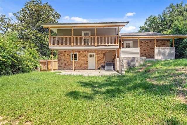 703 Townsend Cir, Chickasaw, AL 36611 - rear view of house with a patio area, brick siding, and cooling unit