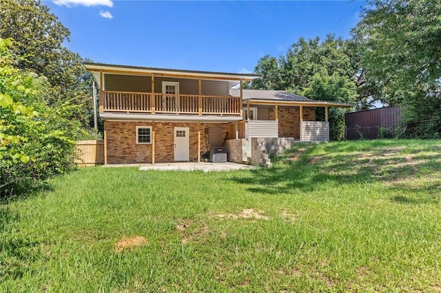 703 Townsend Cir, Chickasaw, AL 36611 - back of house featuring brick siding, a patio, and central AC unit