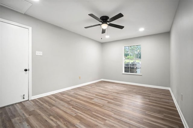 unfurnished room featuring recessed lighting, baseboards, ceiling fan, and wood finished floors