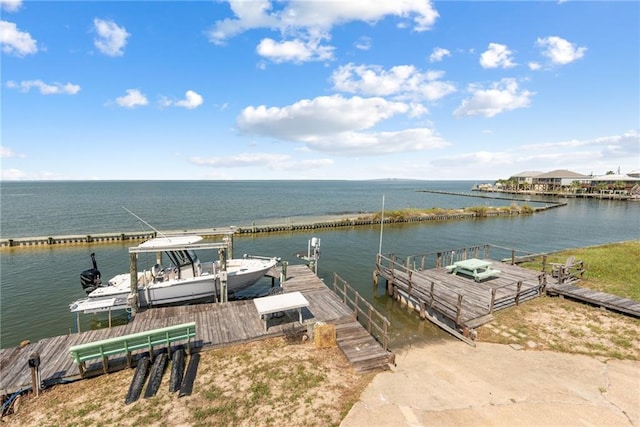 dock area with a water view