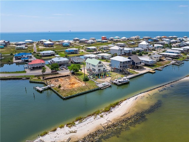 aerial view with a view of the beach and a water view