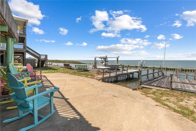 dock area featuring a water view