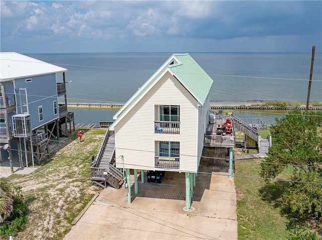 view of outbuilding featuring a water view