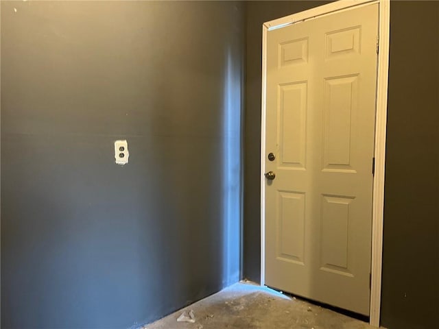 interior space featuring concrete flooring