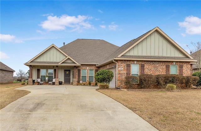 craftsman house featuring a porch, a garage, and a front yard