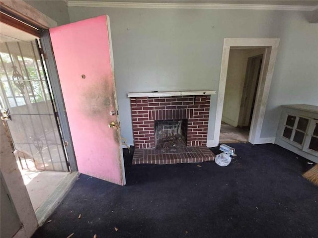 565 Cedar Ave, Mobile, AL 36603 - unfurnished living room with a brick fireplace, ornamental molding, and carpet