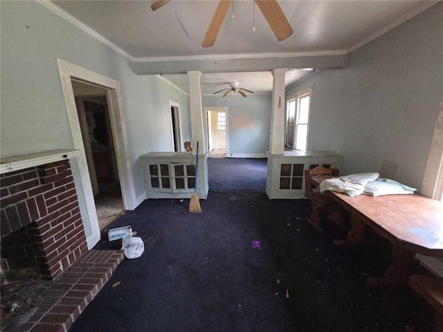 565 Cedar Ave, Mobile, AL 36603 - carpeted living room with ceiling fan, ornamental molding, a fireplace, and ornate columns