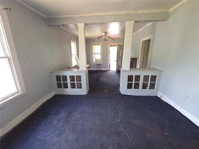 565 Cedar Ave, Mobile, AL 36603 - unfurnished room featuring crown molding, decorative columns, a ceiling fan, and carpet