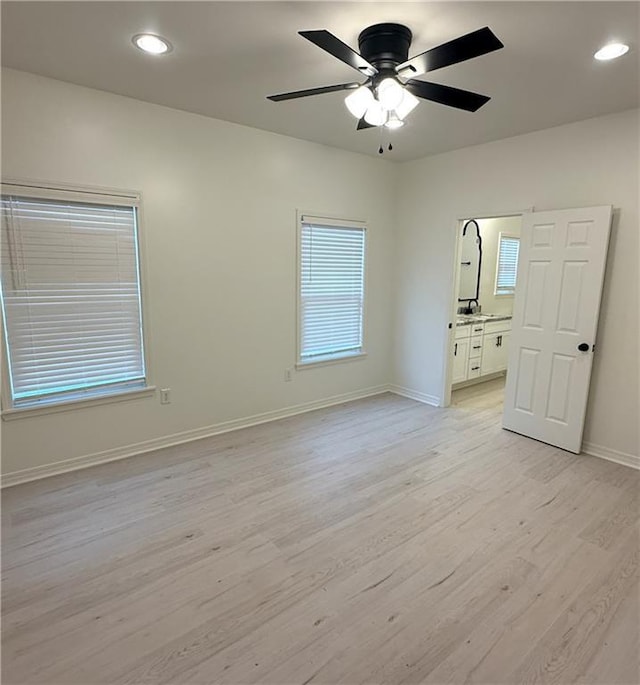 755 Cadillac Ave, Dauphin Island, AL 36528 - empty room featuring light wood finished floors, ceiling fan, plenty of natural light, and recessed lighting