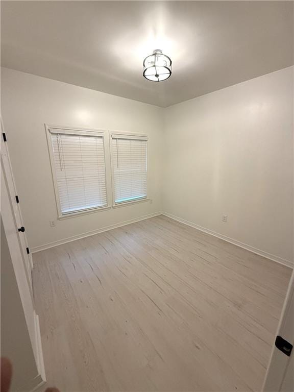 755 Cadillac Ave, Dauphin Island, AL 36528 - spare room featuring wood finished floors and baseboards