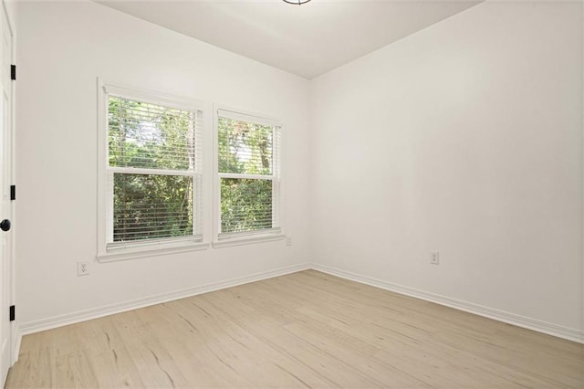 755 Cadillac Ave, Dauphin Island, AL 36528 - empty room featuring light wood-style flooring