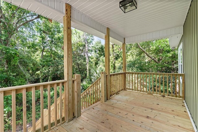 755 Cadillac Ave, Dauphin Island, AL 36528 - deck featuring view of scattered trees
