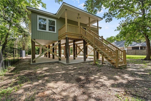 755 Cadillac Ave, Dauphin Island, AL 36528 - rear view of house featuring stairs