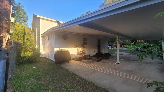 exterior space featuring a carport