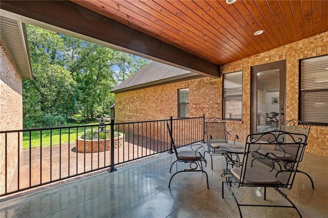 view of patio with a balcony