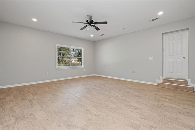 spare room with recessed lighting, baseboards, visible vents, light wood-style flooring, and ceiling fan