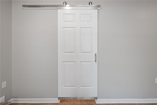 spare room with baseboards