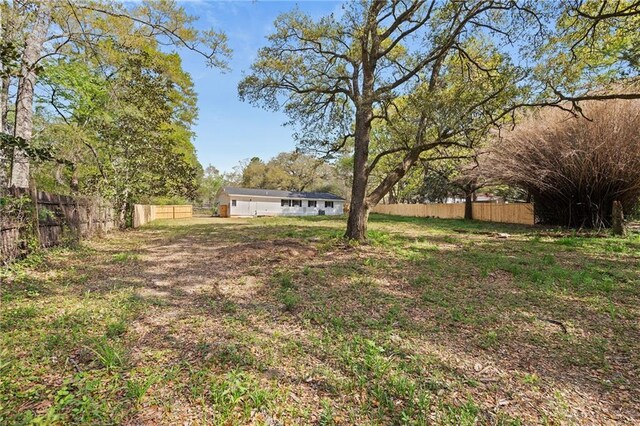 view of yard featuring fence