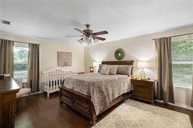 12850 Saeger Rd, Grand Bay, AL 36541 - bedroom with wood finished floors and ceiling fan