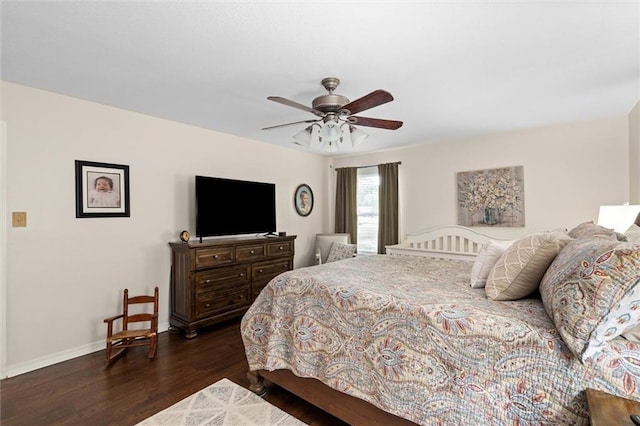 12850 Saeger Rd, Grand Bay, AL 36541 - bedroom with dark wood-style flooring and ceiling fan