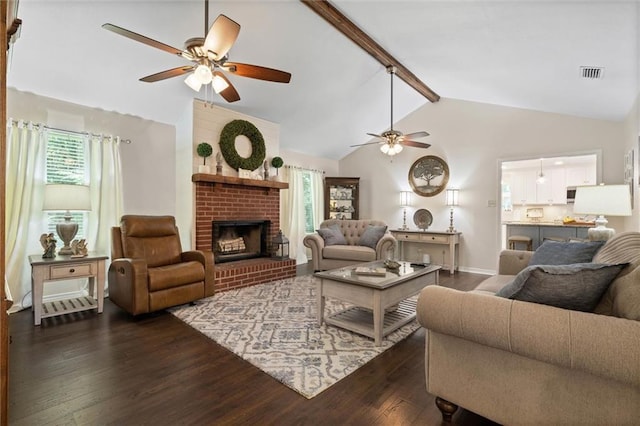 12850 Saeger Rd, Grand Bay, AL 36541 - living room featuring a ceiling fan, dark wood-type flooring, and a brick fireplace