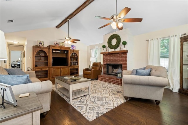 12850 Saeger Rd, Grand Bay, AL 36541 - living room featuring ceiling fan, wood finished floors, a fireplace, and healthy amount of natural light