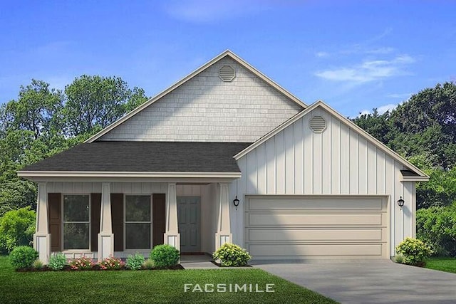 view of front facade with a porch, a garage, and a front lawn