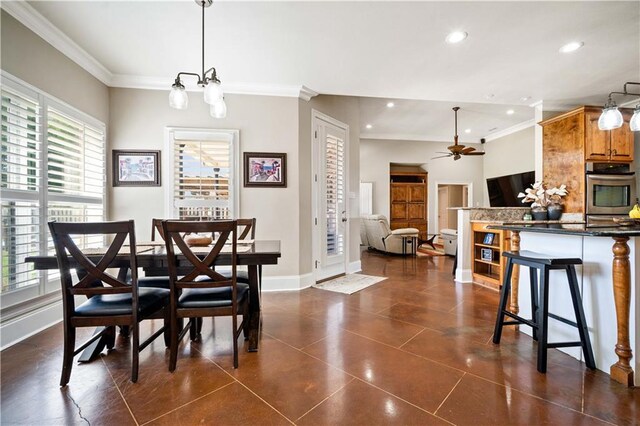 2217 Shandwick Dr, Mobile, AL 36695 - dining room featuring healthy amount of natural light, ornamental molding, recessed lighting, baseboards, and ceiling fan