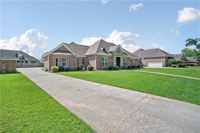 2217 Shandwick Dr, Mobile, AL 36695 - view of front of property with concrete driveway, brick siding, and a garage