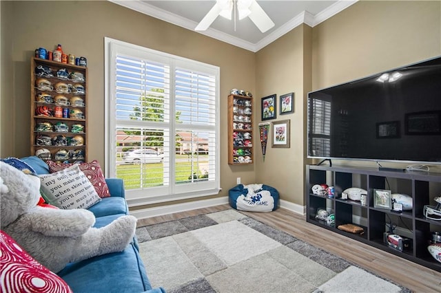 2217 Shandwick Dr, Mobile, AL 36695 - living area with ornamental molding, wood finished floors, ceiling fan, and baseboards