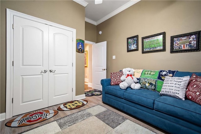 2217 Shandwick Dr, Mobile, AL 36695 - living area with ornamental molding, wood finished floors, baseboards, and a ceiling fan