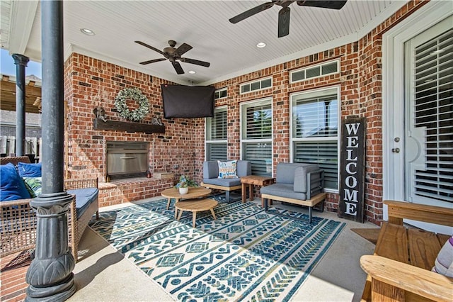 2217 Shandwick Dr, Mobile, AL 36695 - view of patio featuring a ceiling fan and an outdoor living space with a fireplace