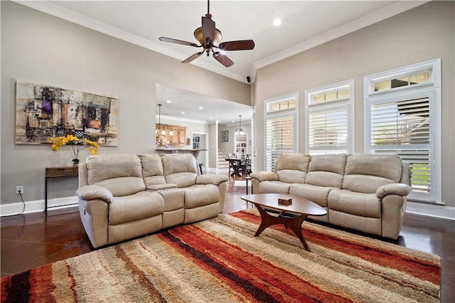2217 Shandwick Dr, Mobile, AL 36695 - living room with ornamental molding, a ceiling fan, baseboards, recessed lighting, and a chandelier