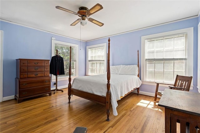 25 Benedict Pl, Mobile, AL 36606 - bedroom with baseboards, light wood finished floors, ceiling fan, and crown molding