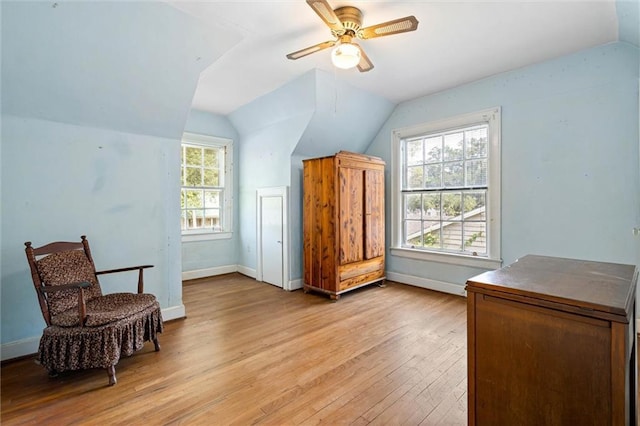 25 Benedict Pl, Mobile, AL 36606 - living area with vaulted ceiling, light wood-style flooring, ceiling fan, and baseboards
