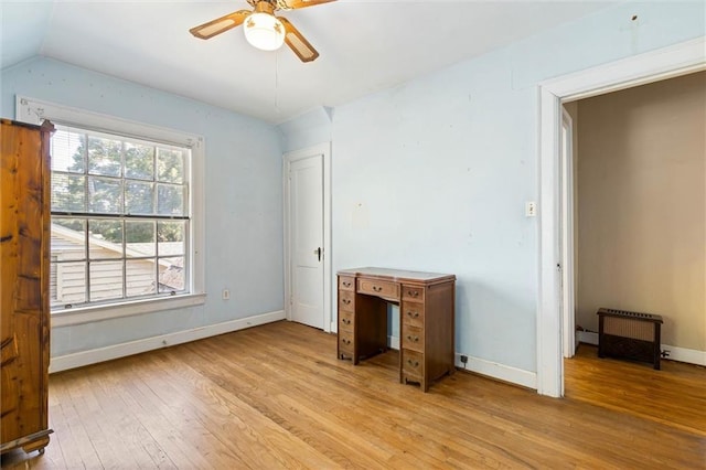 25 Benedict Pl, Mobile, AL 36606 - unfurnished bedroom with light wood finished floors, baseboards, vaulted ceiling, and a ceiling fan