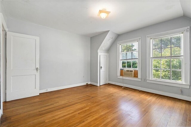 25 Benedict Pl, Mobile, AL 36606 - bonus room with hardwood / wood-style flooring, cooling unit, baseboards, and vaulted ceiling