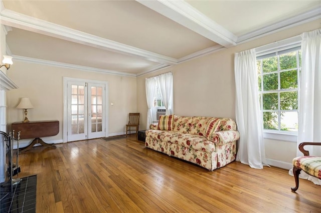 25 Benedict Pl, Mobile, AL 36606 - living room featuring plenty of natural light, wood finished floors, ornamental molding, and beamed ceiling