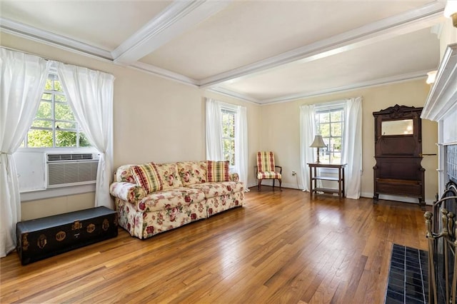 25 Benedict Pl, Mobile, AL 36606 - living area with hardwood / wood-style flooring, crown molding, beamed ceiling, cooling unit, and a fireplace with flush hearth