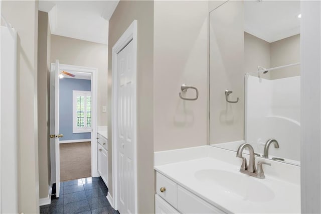 101 Fairhope Ct N Unit 16, Fairhope, AL 36532 - full bathroom featuring vanity, a shower, ceiling fan, and baseboards