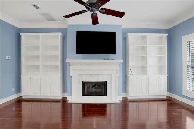 101 Fairhope Ct N Unit 16, Fairhope, AL 36532 - unfurnished living room featuring wood finished floors, ceiling fan, baseboards, crown molding, and a fireplace