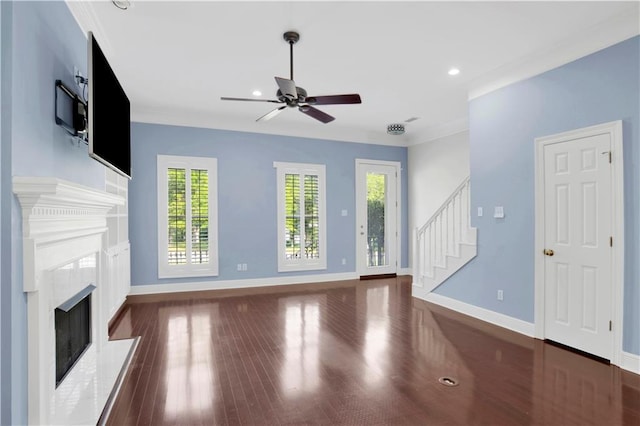 101 Fairhope Ct N Unit 16, Fairhope, AL 36532 - unfurnished living room featuring a premium fireplace, ceiling fan, wood finished floors, stairway, and healthy amount of natural light