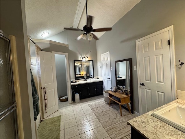 full bath featuring tile patterned flooring, lofted ceiling with beams, a ceiling fan, and a textured ceiling