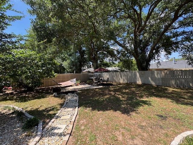 view of yard featuring a fenced backyard