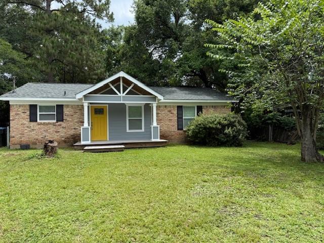 1071 Coke Ct, Mobile, AL 36695 - ranch-style house with brick siding, covered porch, a front lawn, and crawl space