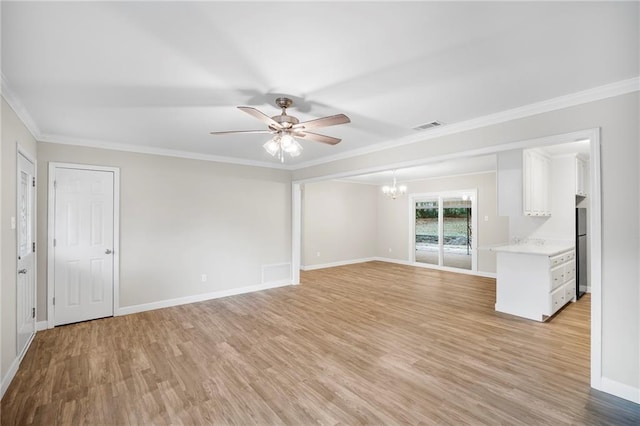 unfurnished living room featuring light wood-type flooring, ceiling fan with notable chandelier, and crown molding