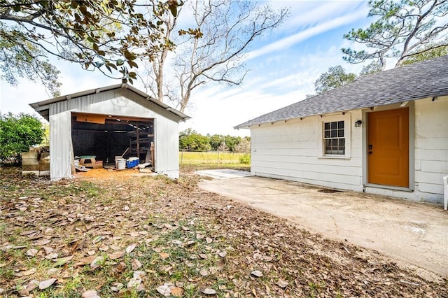 exterior space featuring an outbuilding