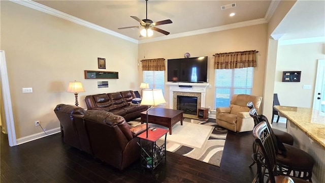 1109 Orlando Dr, Foley, AL 36535 - living area with dark wood-style floors, a ceiling fan, baseboards, a glass covered fireplace, and ornamental molding